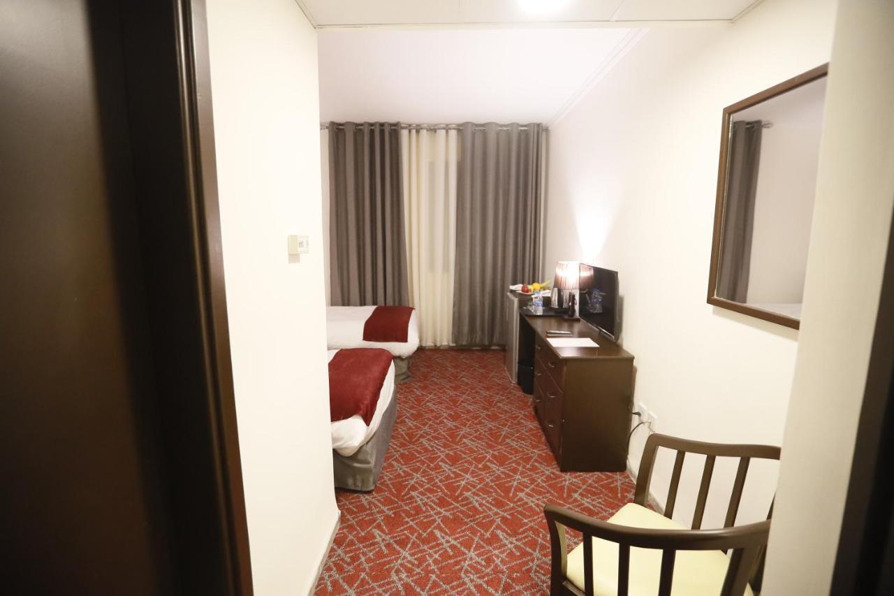 The Signature Hotel Amman Exterior photo